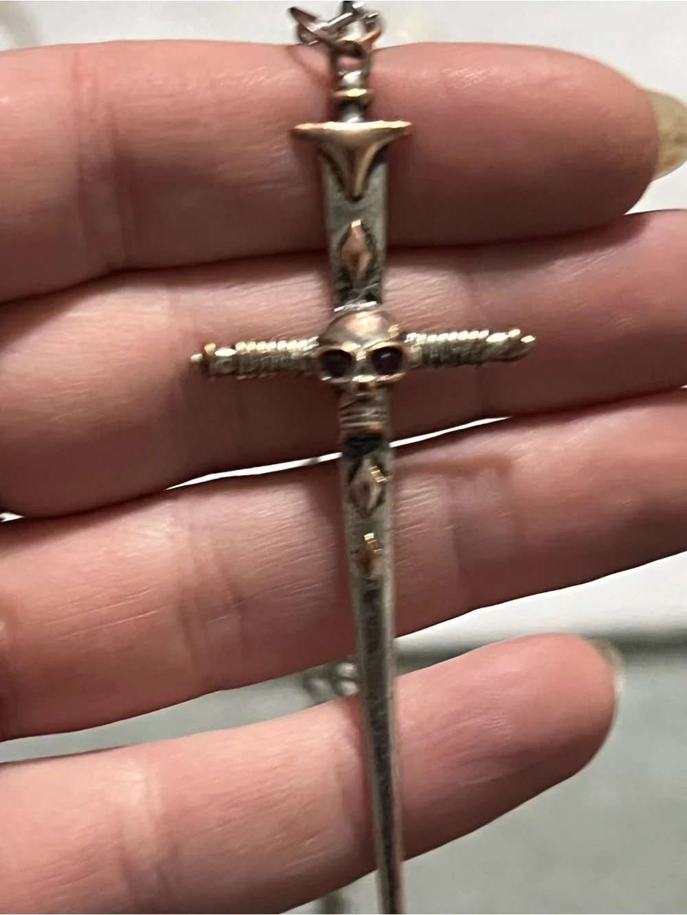 Silver Dagger Cross Necklace with Red Stone Eyes